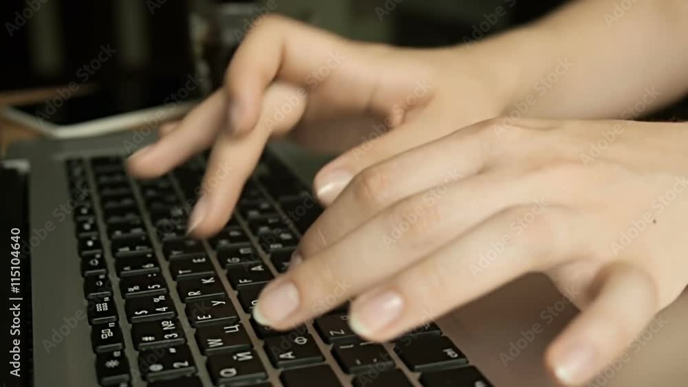 Female hands typing on computer keyboard Female hands typing on computer keyboard