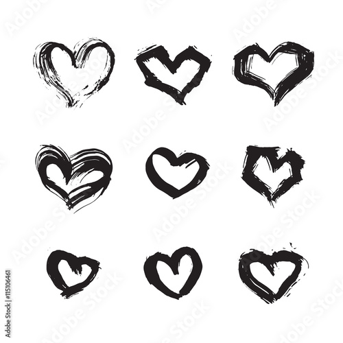 Hand drawn ink heart symbol set. Abstract vector black textured brush heart shape isolated on white background.