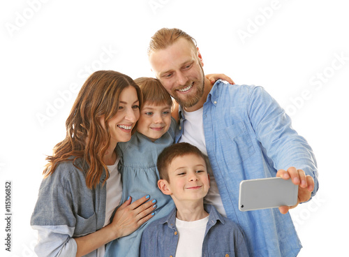 Happy family taking selfie ...
