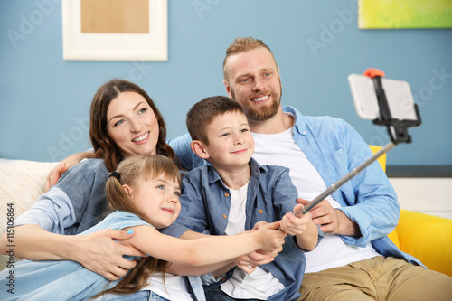 Happy family taking selfie ...
