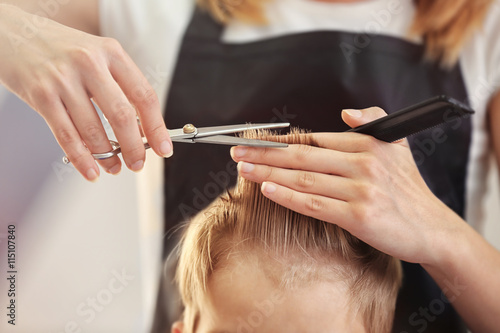 Hairdresser's hands making ...