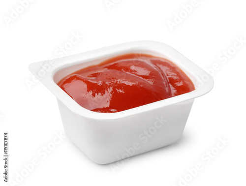 Open ketchup fast food dip packet photo