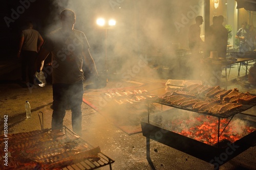 People Cooking Grilled Sardines in San Xoan Night Festive Day photo