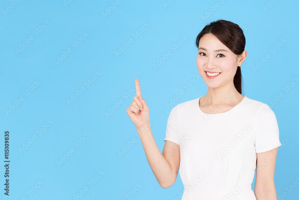 portrait of asian nurse isolated on blue background portrait of asian nurse isolated on blue background