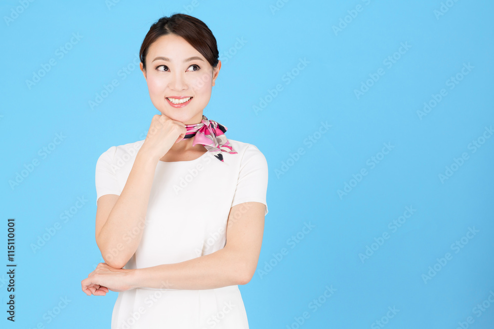 portrait of asian business woman isolated on blue background portrait of asian business woman isolated on blue background