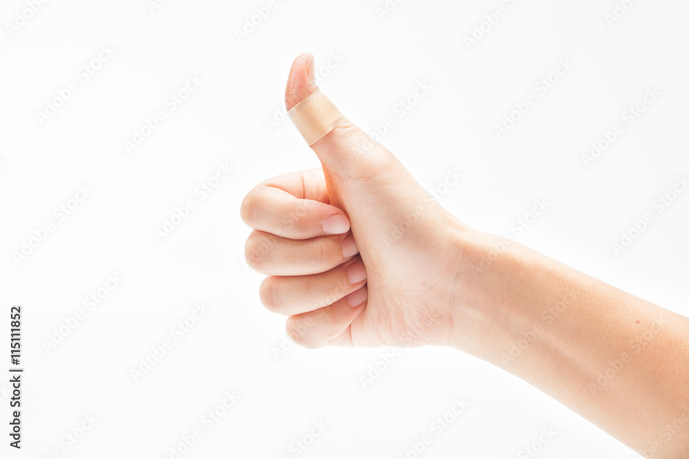 Hurt finger with a bandage isolated on white Hurt finger with a bandage isolated on white