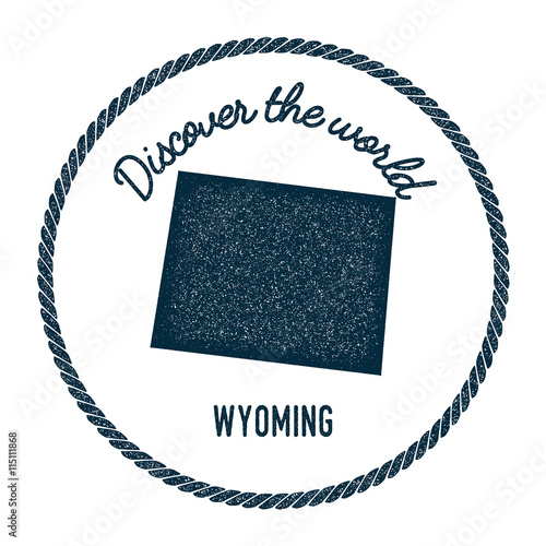 Wyoming map in vintage discover the world rubber stamp. Hipster style nautical postage stamp, with round rope border. Vector illustration.