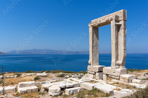 Amazing View of Agean sea and Portara, Apollo Temple Entrance, Naxos Island, Cyclades, Greece