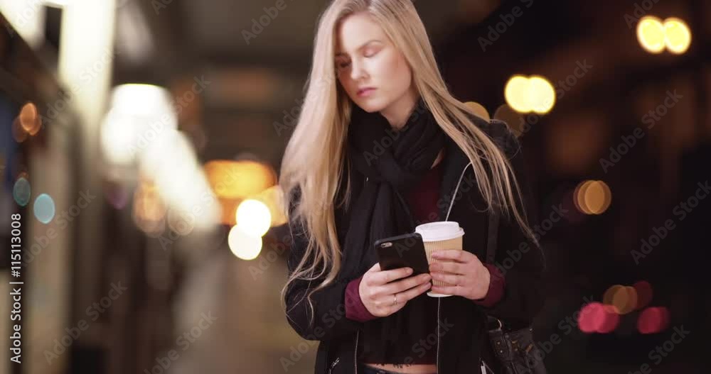 Attractive blond girl waits for date to pick her up by metro train Attractive blond girl waits for date to pick her up by metro train