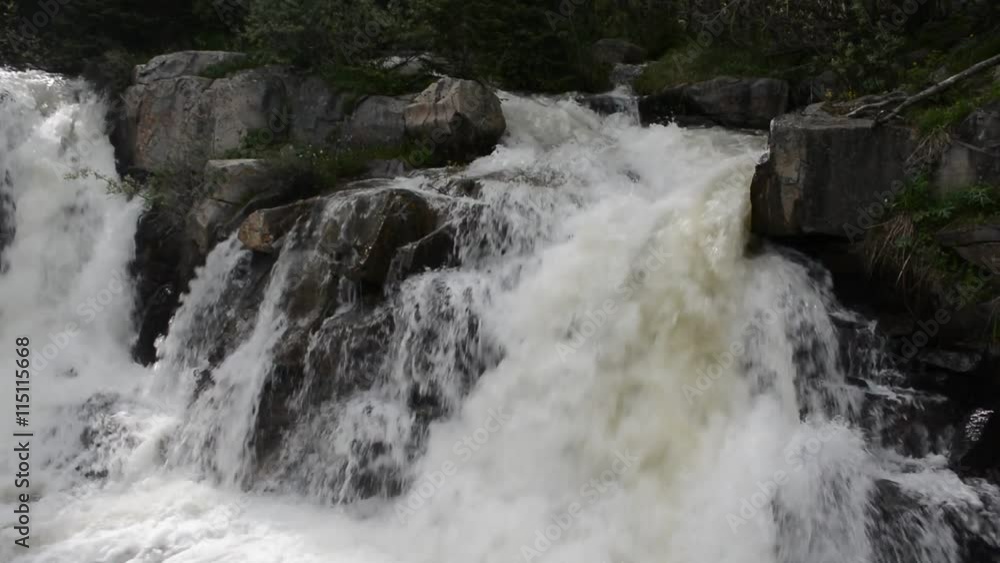 Waterfalls on a Creek Swelled To Very High Level Due to Snow Melt Waterfalls on a Creek Swelled To Very High Level Due to Snow Melt
