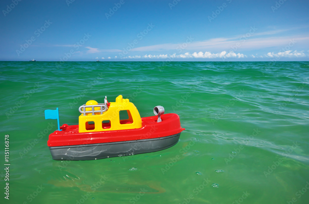 Premium Photo  A toy boat on water