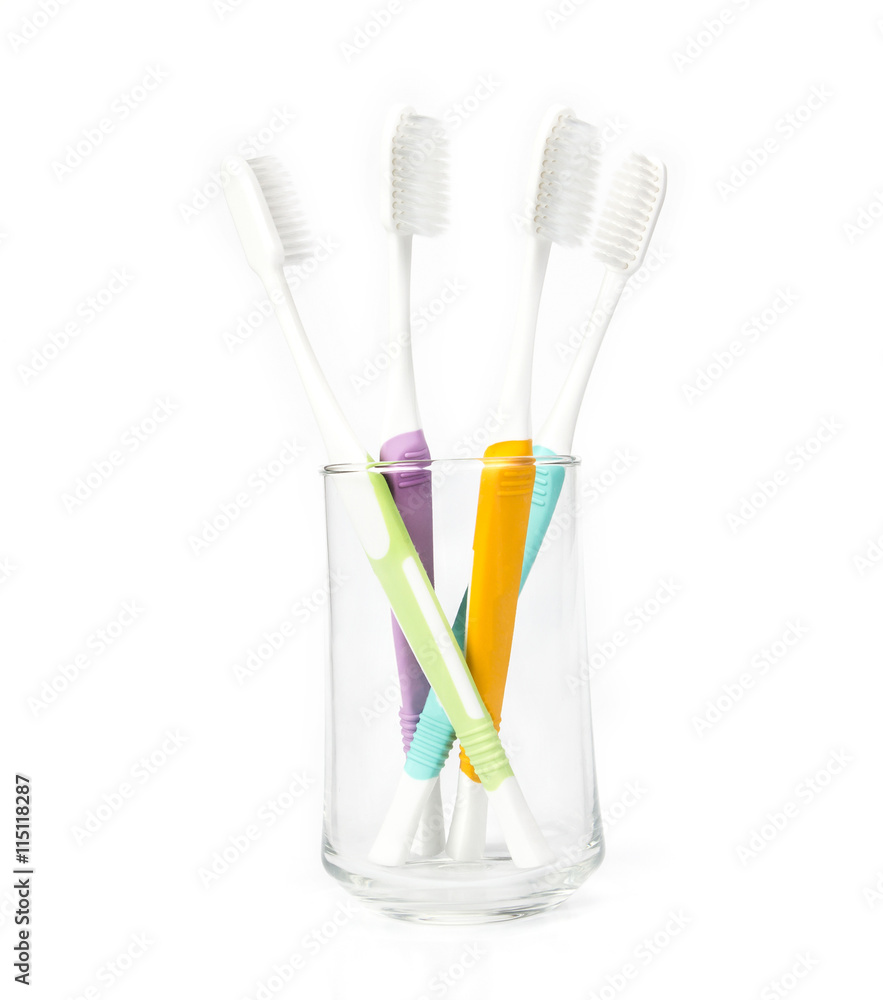 toothbrush in transparent glass on white background toothbrush in transparent glass on white background