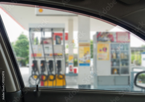 Background abstract blurred of Car fueling at a gas station