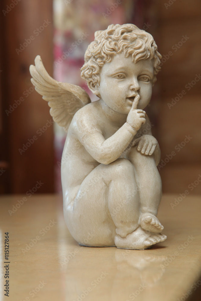 Fototapeta premium the Stone Angel on the shelf