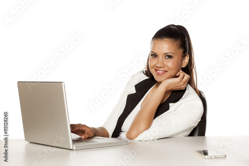 beautiful business woman posing with her laptop © vladimirfloyd