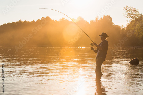 Fisherman sunset, cowboy hat, fog