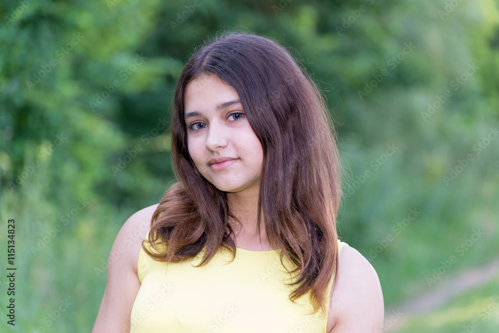 beautiful girl 14 years old posing on summer nature Stock Photo