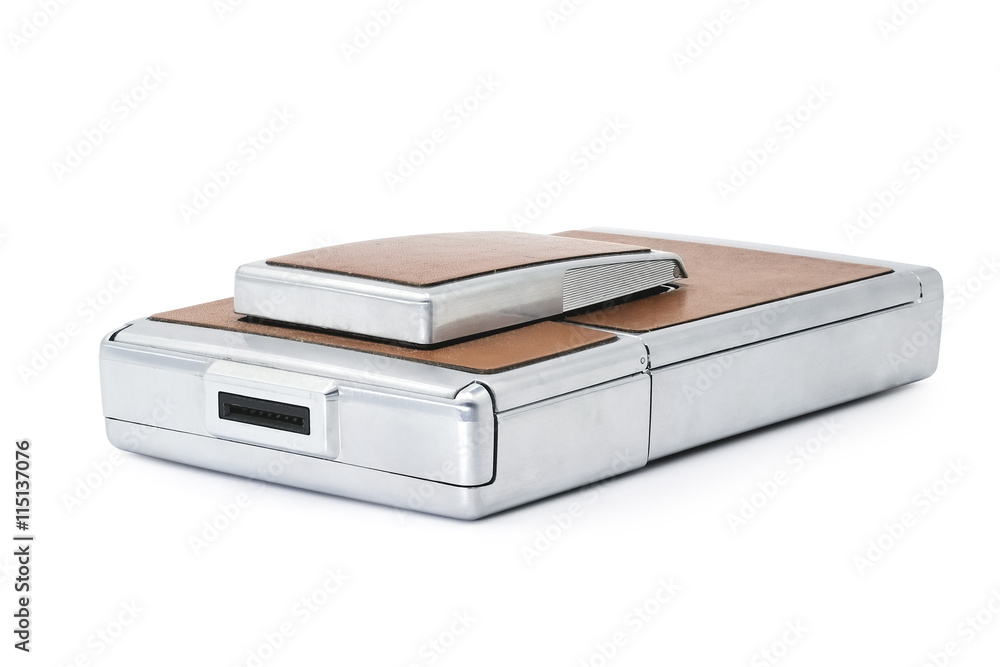 old instant camera on white background, being opened old instant camera on white background, being opened