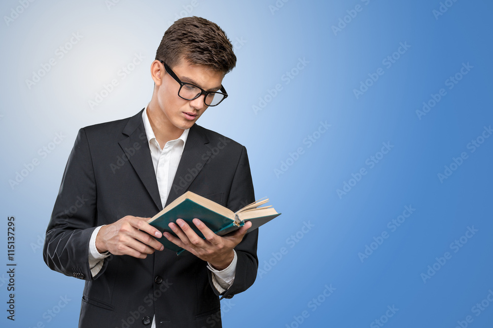 Handsome young business man with a book Handsome young business man with a book