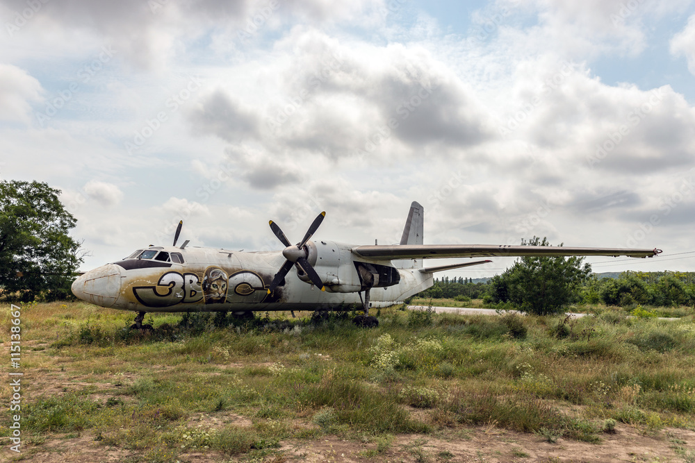 Older aircraft flying in an abandoned airport Older aircraft flying in an abandoned airport