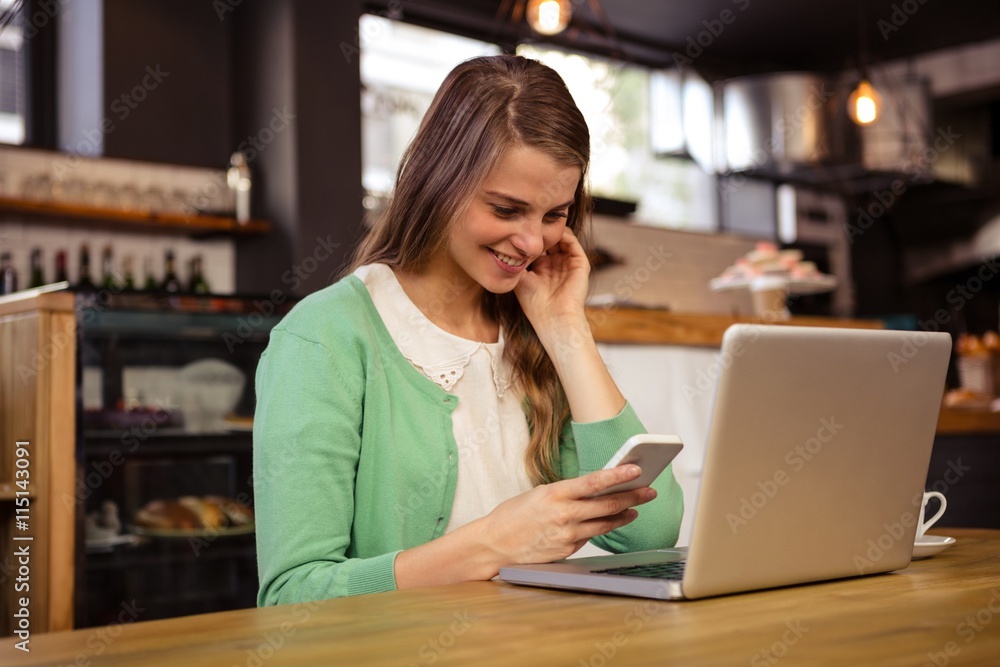 Smiling woman using technology Smiling woman using technology