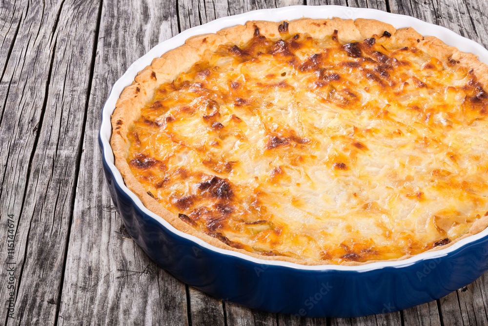 French onion quiche or pie in a gratin dish French onion quiche or pie in a gratin dish