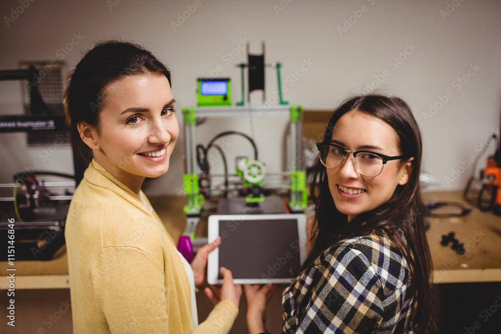 Graphic designers holding digital tablet Graphic designers holding digital tablet