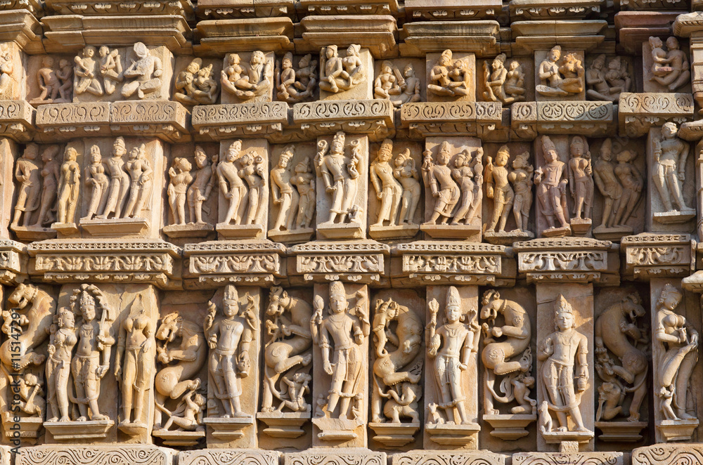 Ancient bas-relief at famous erotic temple in Khajuraho, Madhya Pradesh, India