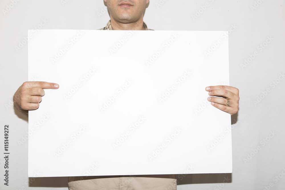 man holding white blank billboard.Hand on a billboard. Isolated on white background man holding white blank billboard.Hand on a billboard. Isolated on white background