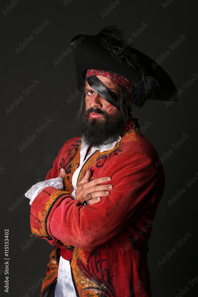 Portrait of handsome man in a pirate costume Portrait of handsome man in a pirate costume