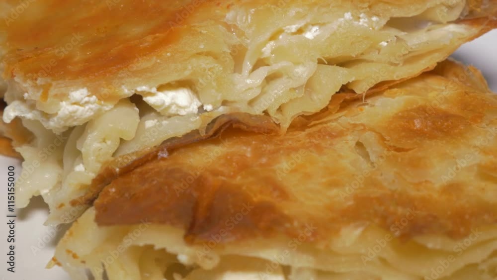 Burek Serbian well known fast food made from dough and cheese 4K 2160p UHD video - Burek traditional breakfast meal in Serbia 4K 3840X2160 UHD footage Burek Serbian well known fast food made from dough and cheese 4K 2160p UHD video - Burek traditional breakfast meal in Serbia 4K 3840X2160 UHD footage