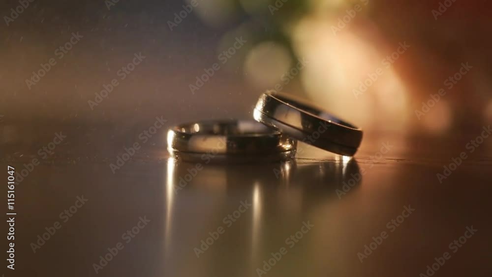 Beautiful wedding ring on the table and brought into focus the camera Beautiful wedding ring on the table and brought into focus the camera