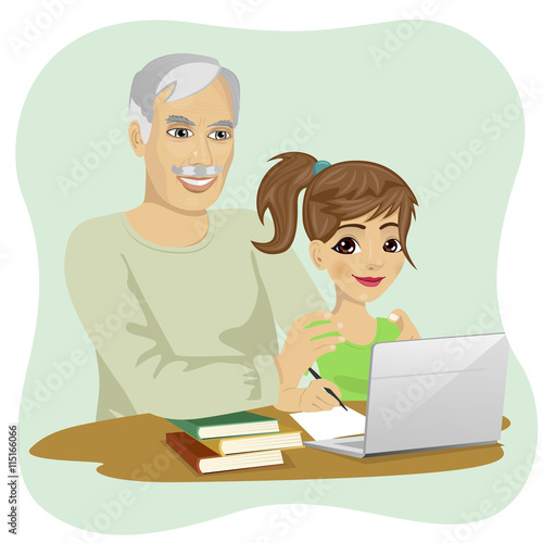 cute granddaughter helping grandfather to use laptop