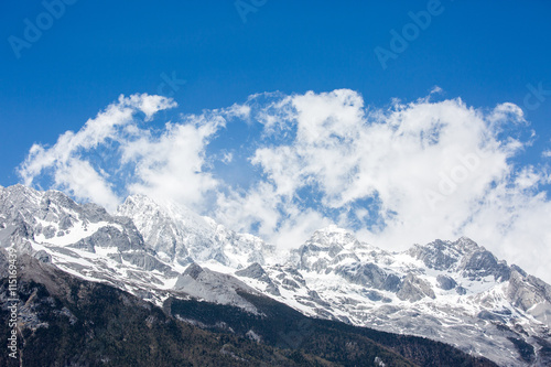 blue sky with tiny cloud closeup at Jade dragon snow moutain tourism spot © Pises Tungittipokai