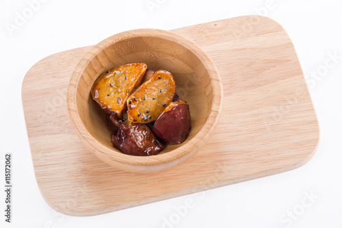 japanese dessert Daigaku IMO in wooden bowl , on isolated white photo