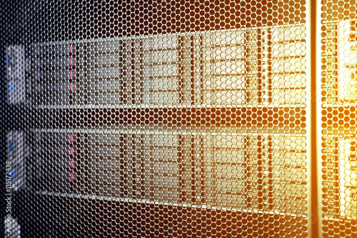 computer server in rack with blue light close up