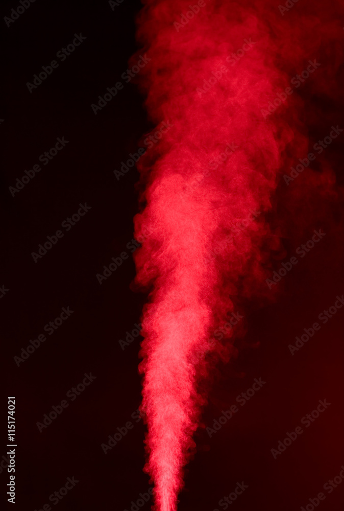 Red vapor on the black background