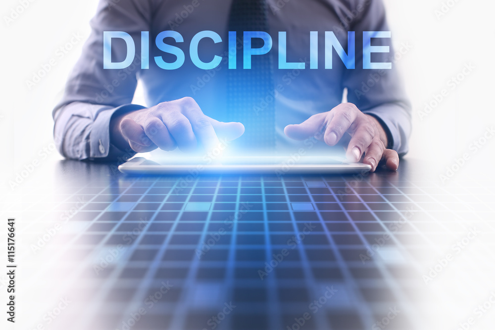 Businessman is pressing button on tablet pc and selecting Discipline. Businessman is pressing button on tablet pc and selecting Discipline.