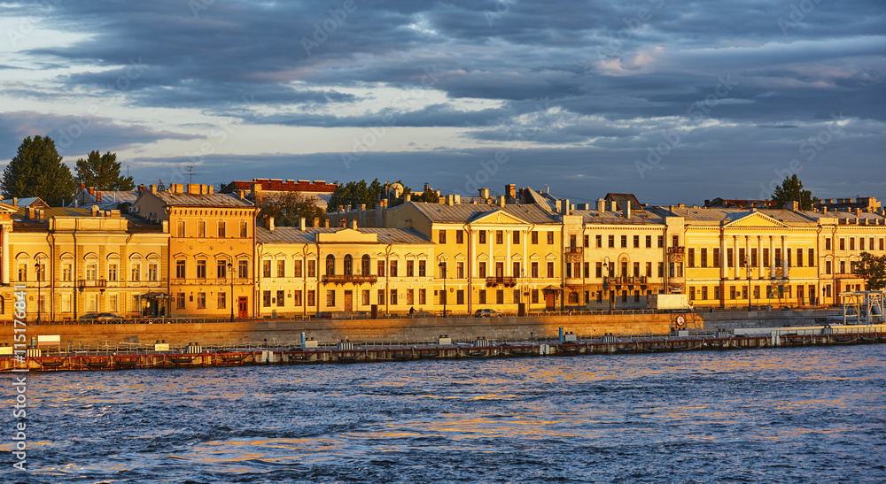 The houses on the waterfront of St. Petersburg during sunset