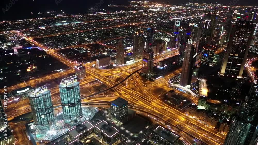 View on the night Sheikh Zayed road from Burj Khalifa skyscraper in Dubai, UAE. Burj Khalifa - megatall skyscraper and currently the tallest structure in the world, 829,8 m or 2,722 ft View on the night Sheikh Zayed road from Burj Khalifa skyscraper in Dubai, UAE. Burj Khalifa - megatall skyscraper and currently the tallest structure in the world, 829,8 m or 2,722 ft