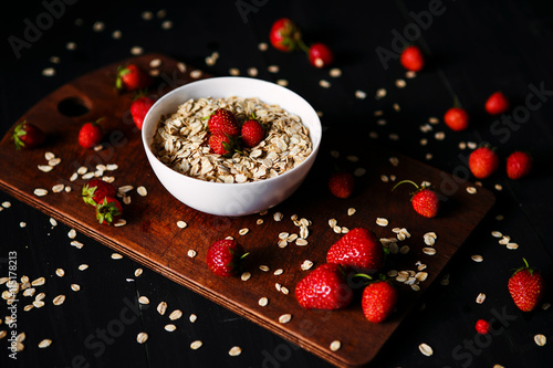 Healthy breakfast, muesli, granola with strawberries, health and