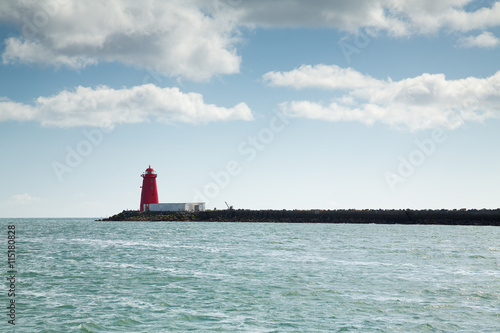 Poolbeg Lighthouse viewed from a boat in Dublin bay, Dublin, Ireland 
