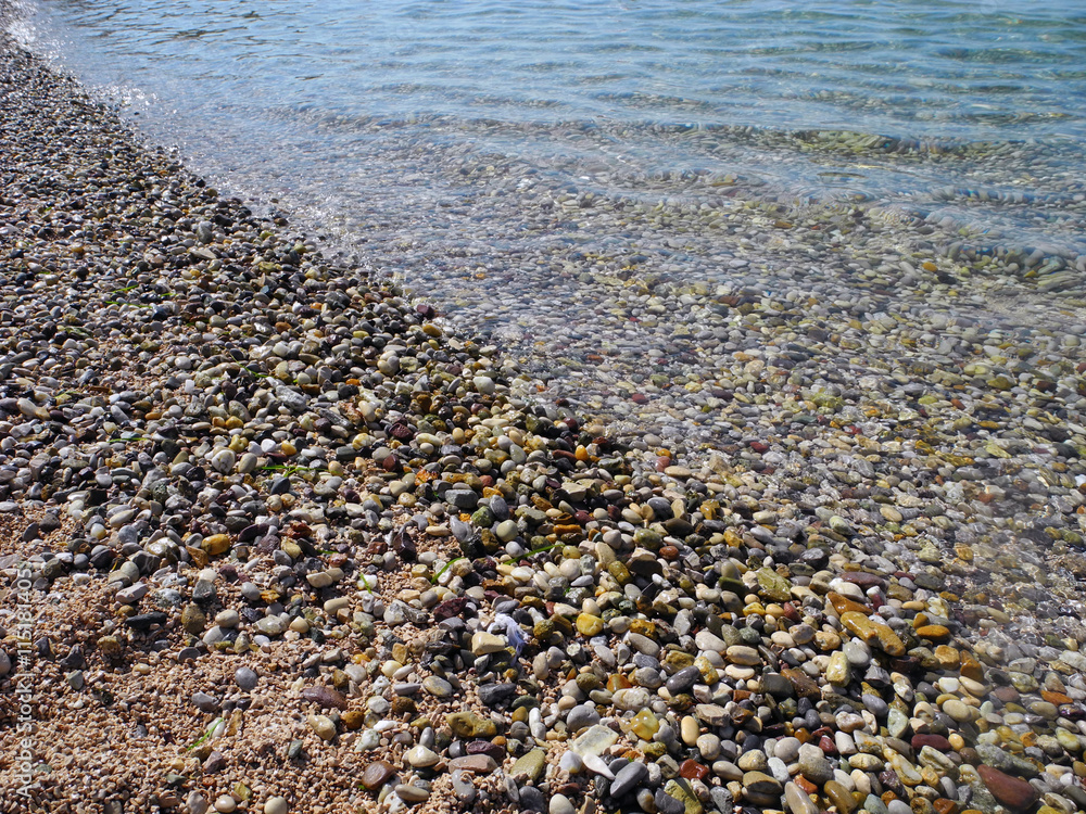 Background of pebbles and sea. Background of pebbles and sea.