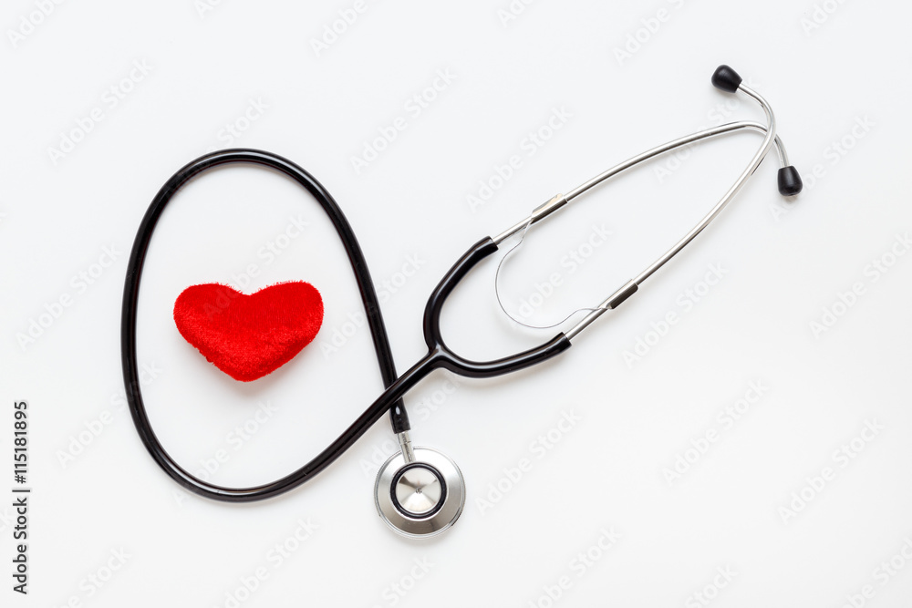 concept of life stethoscope on white background with plush heart concept of life stethoscope on white background with plush heart