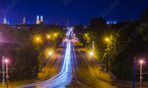 Night view of illuminated maximilianstrasse in bavarian capital munich which leads towrds maximilianeum building. photo