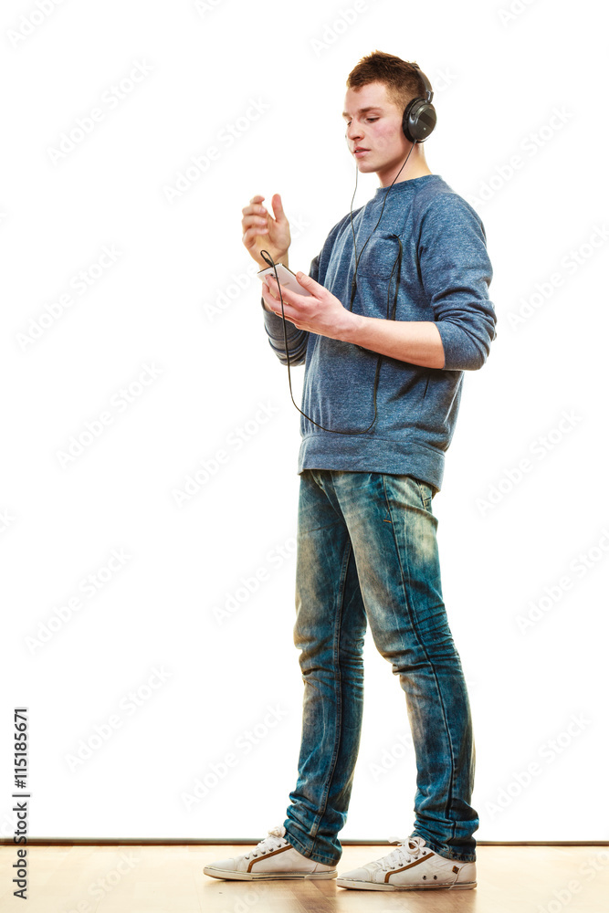 Fototapeta premium Young man with headphones listening music