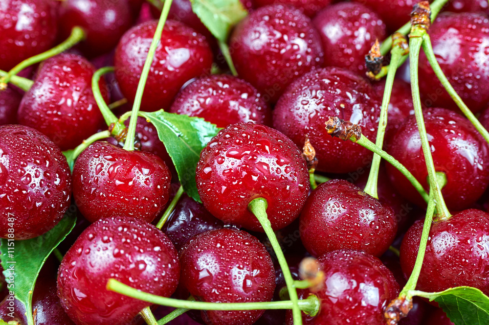 A pile of fresh fruits. Cherry fruit background A pile of fresh fruits. Cherry fruit background