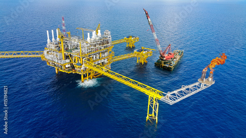 Offshore construction platform for production oil and gas, Oil and gas industry and hard work,Production platform and operation process by manual and auto function, oil and rig industry and operation.