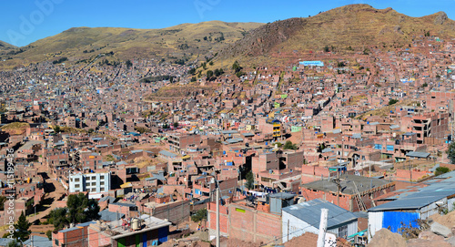 Top view on roofs and streets of Cusco town © Aleksandr Volkov