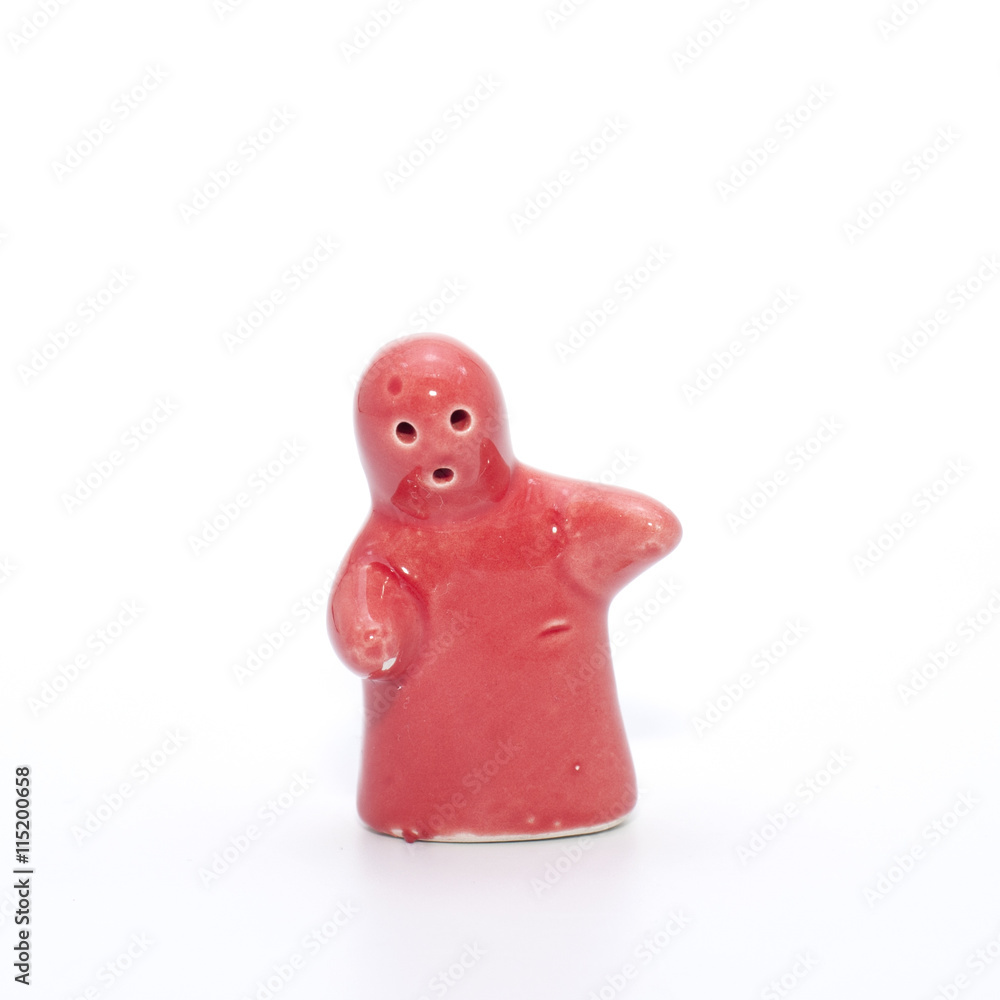 Ceramic doll with red and white. Ceramic doll with red and white.